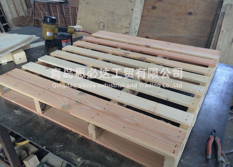 Four-beam wood pallet